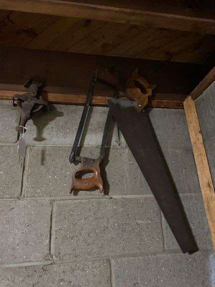 Vintage pulley and hand saws image