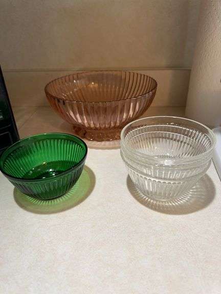 3 clear glass small bowls, green glass small bowl. large pink glass bowl image