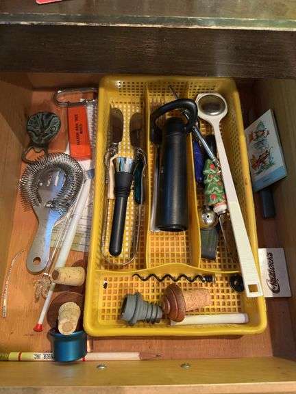 Contents of 2 drawers behind bar image