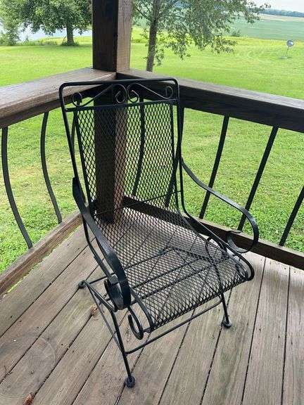 2 metal patio chairs and side table image