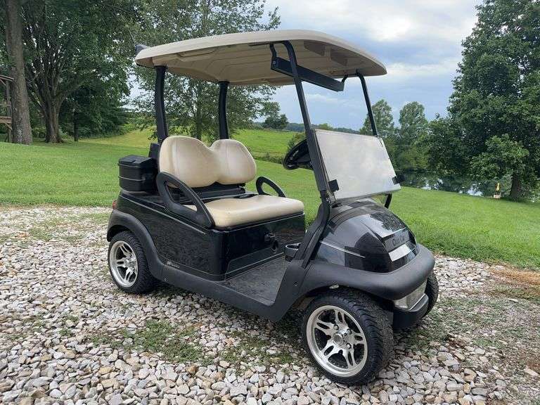 2005 Club Car 2 person golf cart with charger image