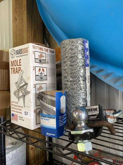 Mole trap, hub cap, chicken wire, Reese hitch, light fixture, light cover image