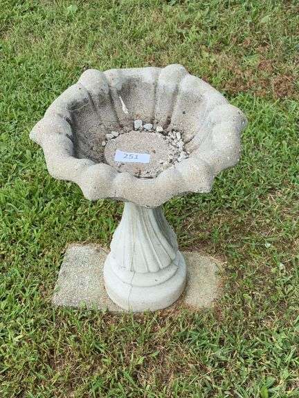 Small concrete bird bath image