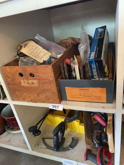 Hand saws, miter saw, hand saws, drill bits, box of miscellaneous hardware image