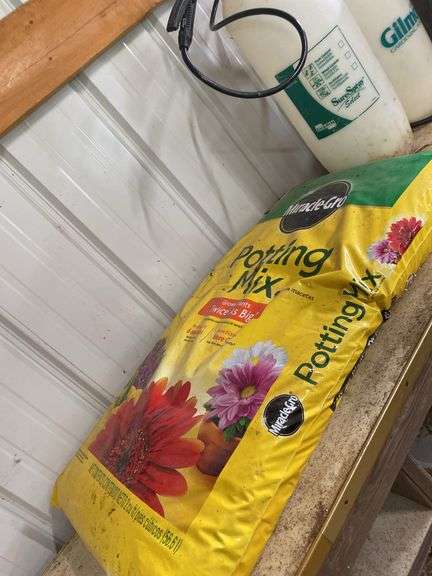 Bag of potting mix 2 cu ft, 2 sprayers image