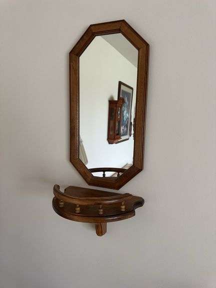 Pair of wall shelves and mirrors image
