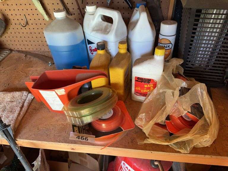 Bug light, weed eater string, lubricants, anti freeze, misc image