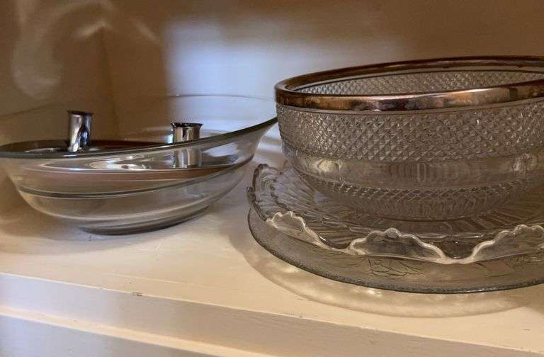 Clear glass 3 decorative plates, 2 bowls, silver candle base for centerpiece image