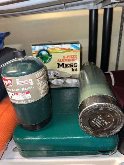Camp stove, propane fuel, mess kit, Stanley thermos image