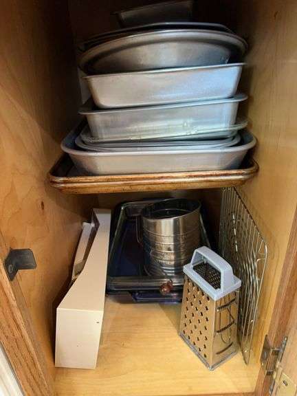 Lot of baking pans, baking sheets, sifter, grater, 2 small skillets image