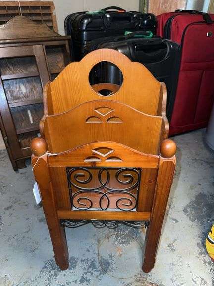 Wood magazine rack elevated on legs image