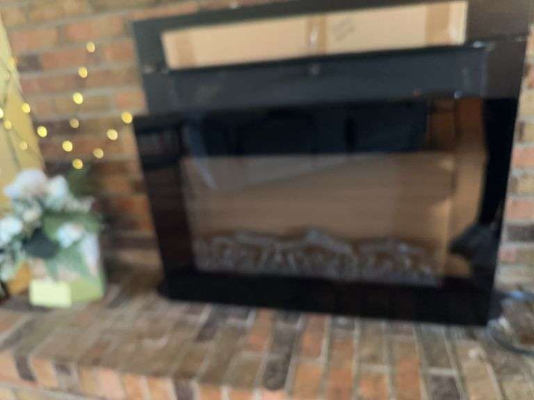 Electric fireplace with extra rock log image