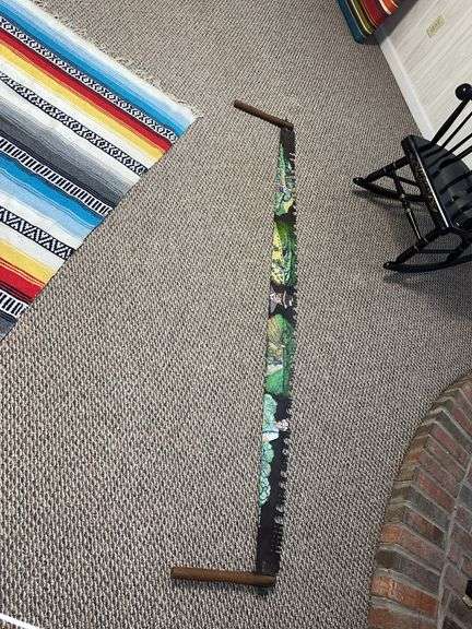 Hand painted vintage two-man saw image