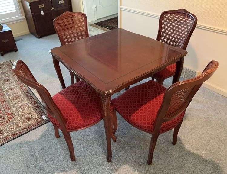 Cherry dinette table with Queen Anne style legs, 4 chairs with padded seats and carved cane backs, 34sq x 29”h image