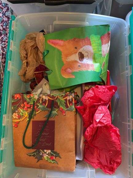 5 tubs with Christmas bags, ornaments, bows, stockings, decorations image