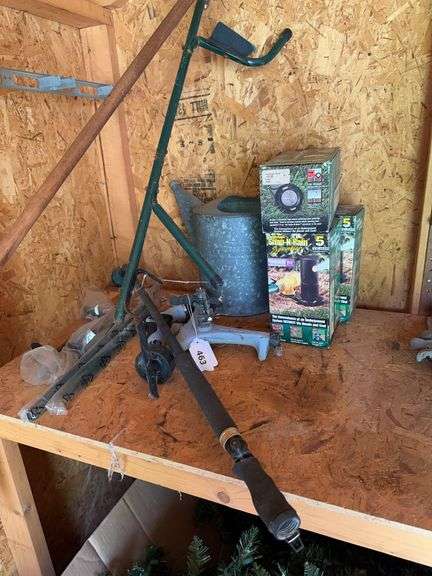 3 sprinklers, watering can, metal sprinkler, hose nozzles image