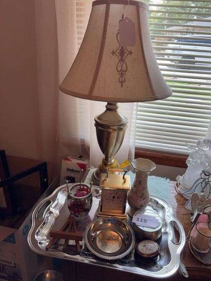 Table lamp, silverplate tray w/ vase, clock, candle holder, bowl, mirrored lid jar image