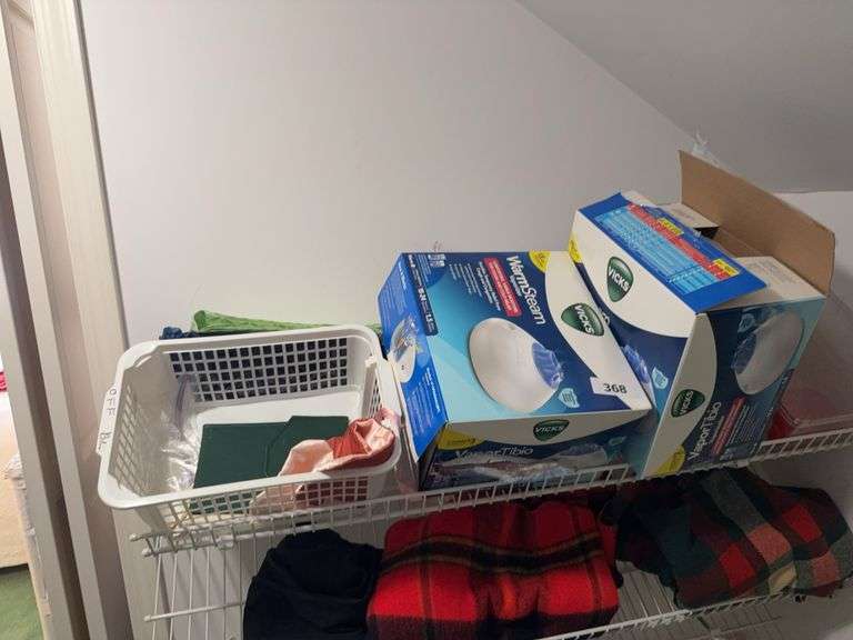 2 Vicks vaporizers, blankets, shoe stretchers, plastic basket image