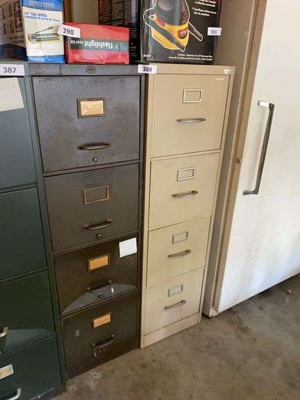 2 file cabinets, 15”w x 27”d x 52”h, dent in 3rd drawer, excludes contents on top image