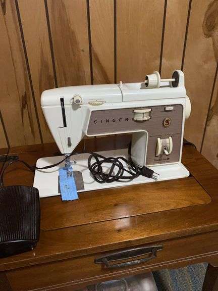 Singer sewing machine in cabinet, sewing box and accessories image