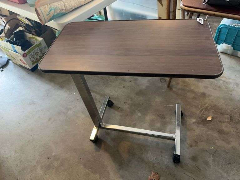 Rolling adjustable height bedside table image