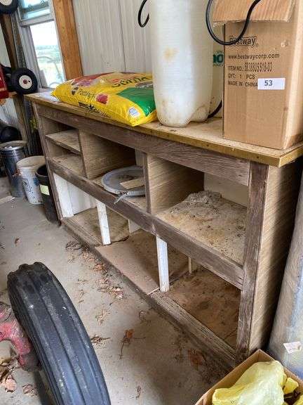 Free standing wood framed shelf 6’w x 18”d x 41”h, excludes all contents image