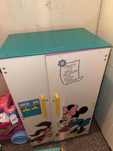 Wooden Minnie Mouse cabinet, Mega Blocks, Leap Frog musical mat, child’s blankets, pack n play image