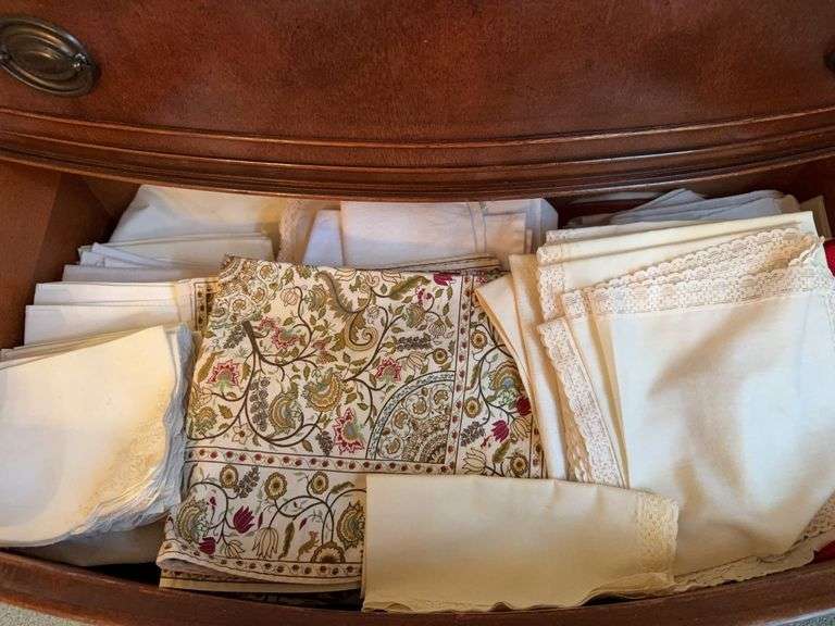 Contents of bottom 2 drawers of chest in dining room image