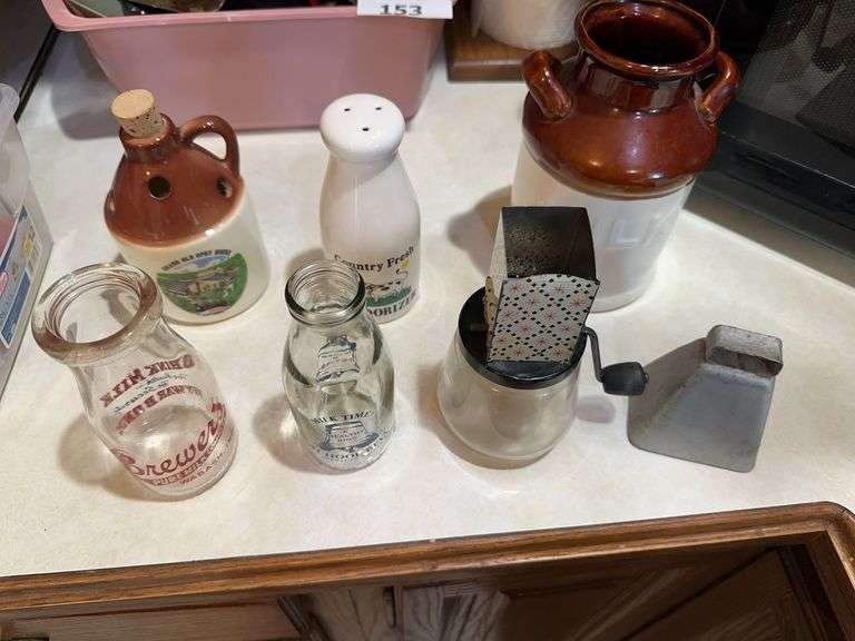 Vintage milk bottles, vintage nit chopper, milk jug, cow bell, Grand Ole Opry advertising jug image