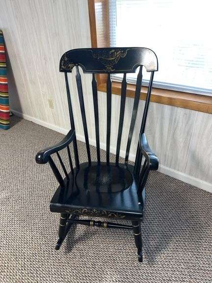 Vintage black rocking chair with stencil image