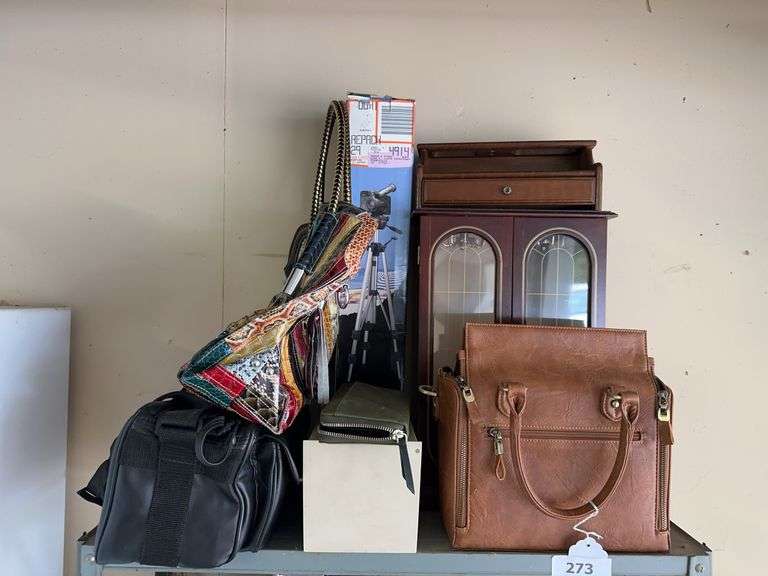 Tripod, camera, bags, jewelry cabinet image