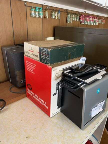 Kodak movie projector, film splicer, stereoscopic camera and viewer, it. film scanner image