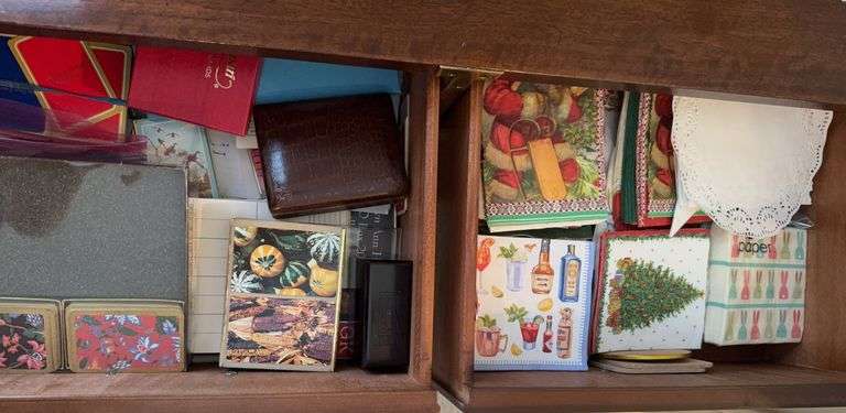Contents of 2 drawers, playing cards, paper napkins image