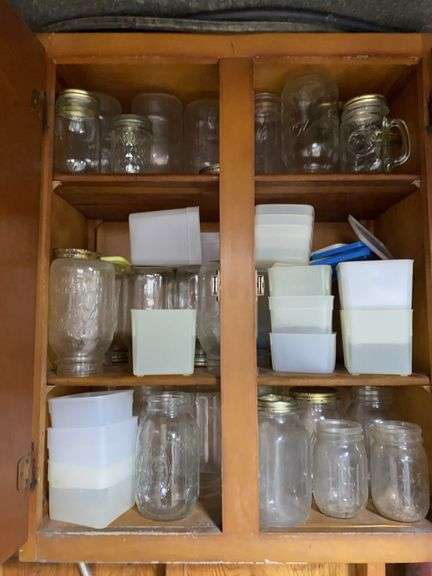 Canning jars and plastic containers image