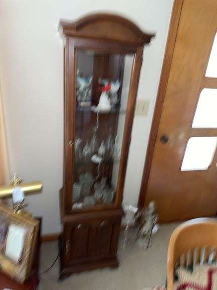 Glass front lighted curio cabinet image