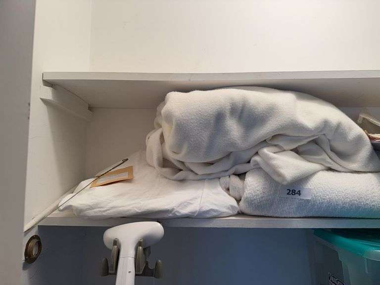 Lot of blankets, paper doilies image