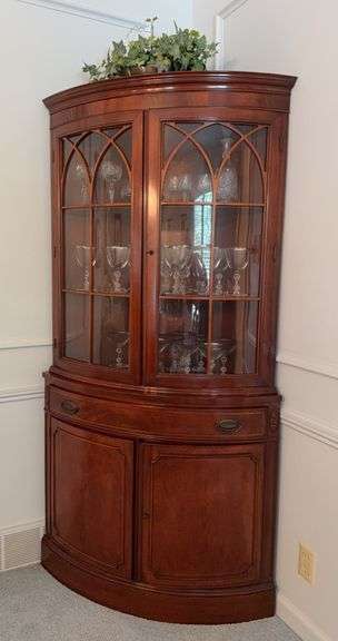 Mahogany curved front corner cabinet with glass front image