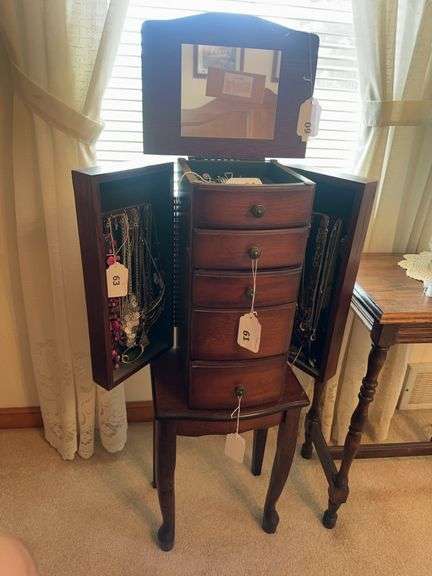 Footed jewelry cabinet- excludes contents image