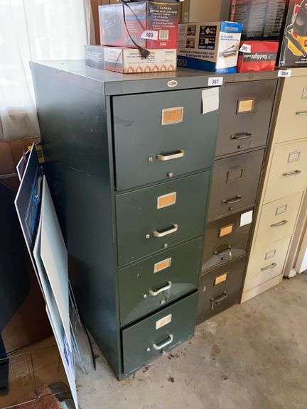 Wesco file cabinet, 18”w x 28”d x 52”h (heavy dent in 3rd drawer), excludes contents on top image