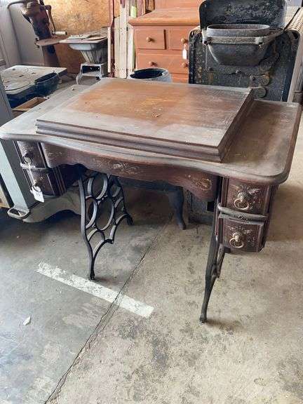Vintage sewing machine cabinet, no machine or treadle and wheel image