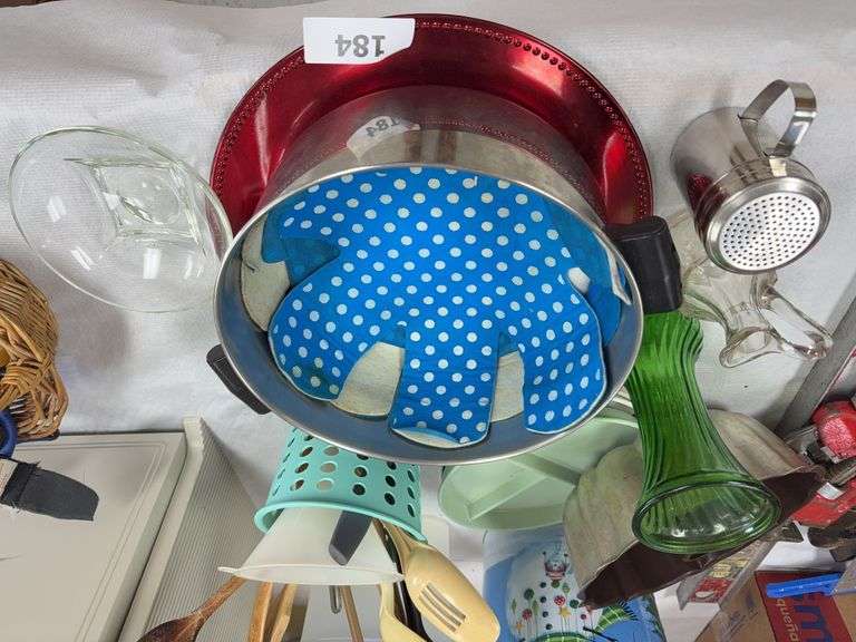 Pot, bundt pan, tins, cruet, vase, bowl, plates, utensils image