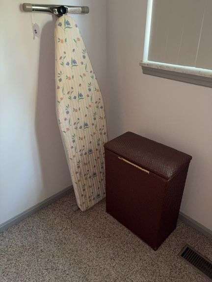 Ironing board, clothes hamper image
