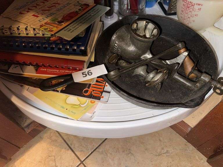 Cookbooks, meat grinder, iron skillet image