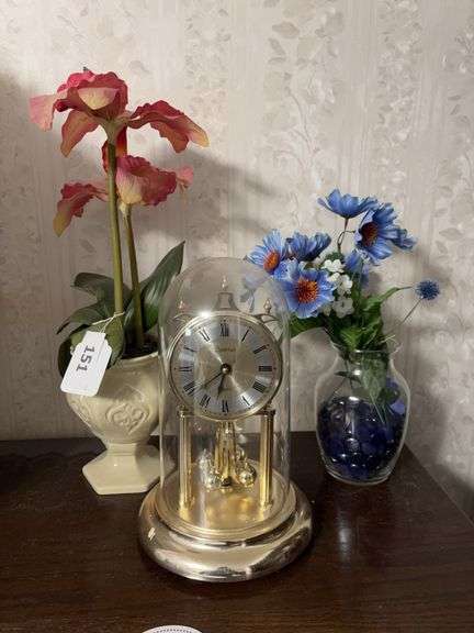 Spartus Anniversary Clock, 2 artifical flower arrangements image