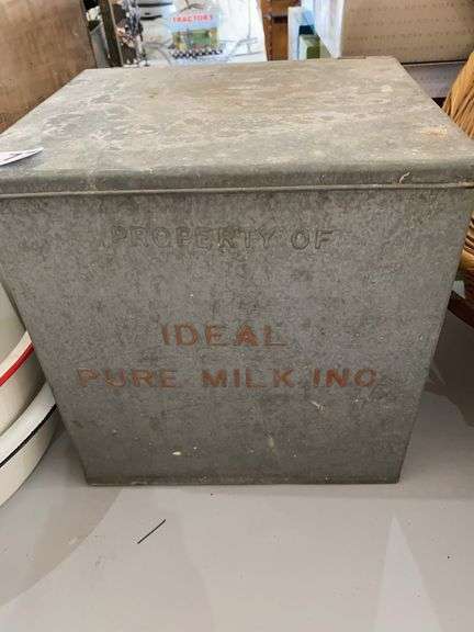 Ideal Milk Brand cooler with 5 milk jugs image