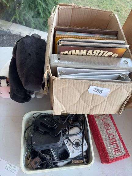 Misc books, brick door stop, misc image