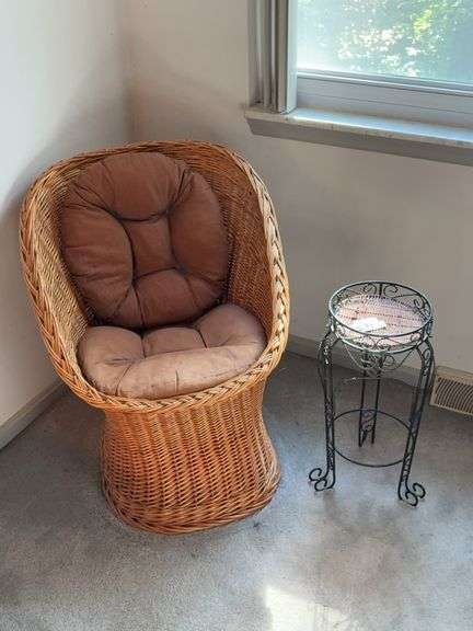Wicker chair, metal plant stand image