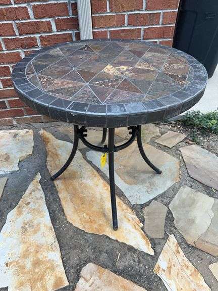 Stone top patio table image