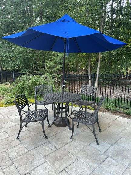 Patio table with 4 chairs, Sunbrella umbrella (used only one season) and stand image