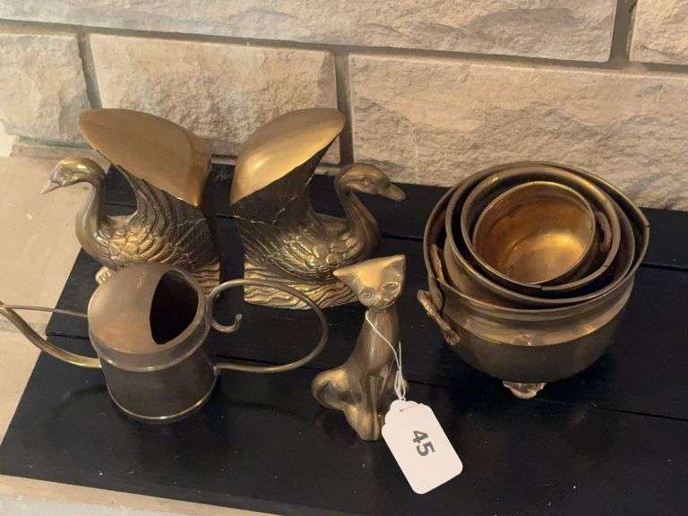 Brass swan bookends, brass cat , bowls, sprinkler